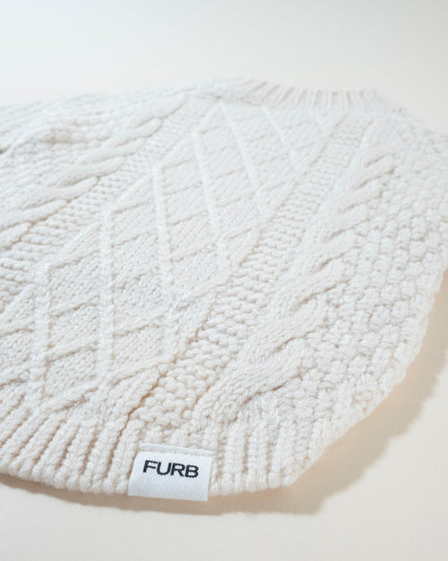 Ivory cable knit sweater for dogs, perfect for keeping your furry friend warm.