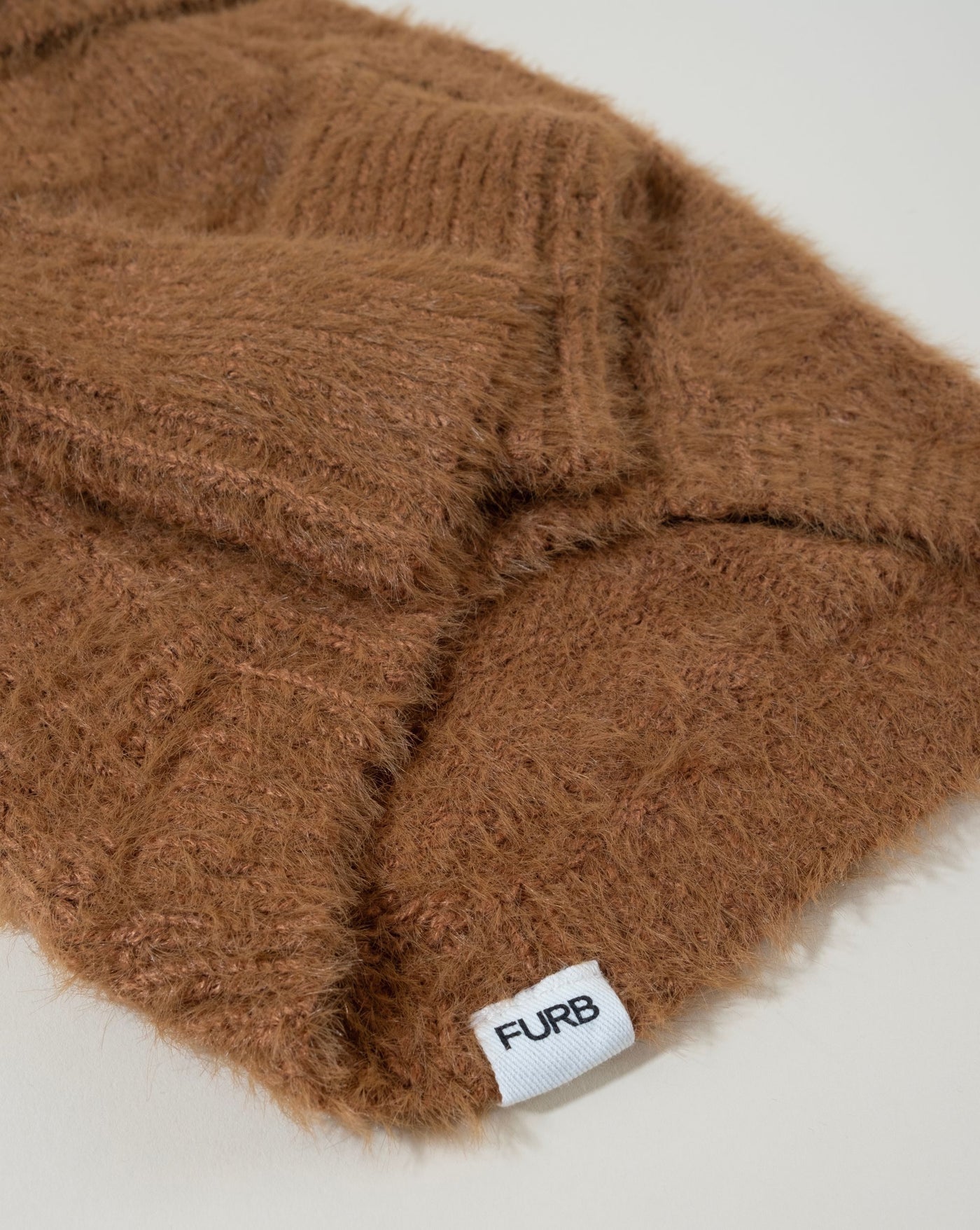 Stylish Bobbi brown eyelash knit sweater for dogs, perfect for cooler days.