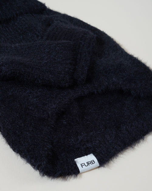 Warm black eyelash knit dog sweater, perfect for snuggling in style.