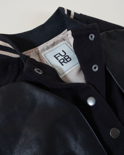 Black leather dog jacket, perfect for winter walks and outings with your pet.