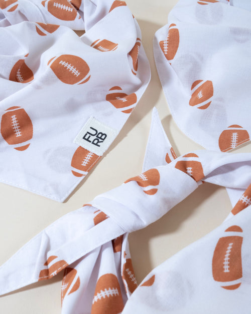 Football dog bandana for sporty pups, perfect for supporting the team in style.