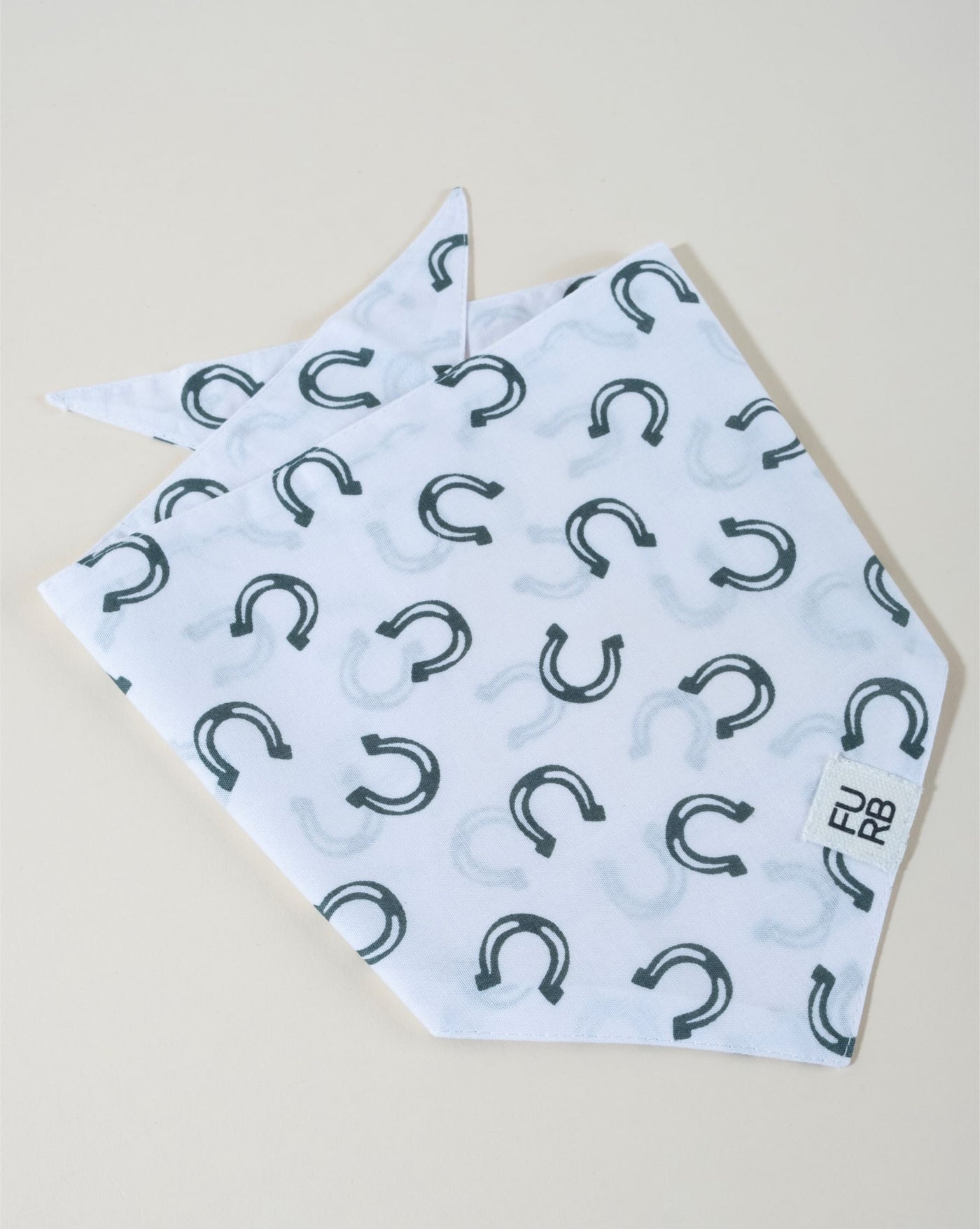 Horseshoe print dog bandana, great for adding a lucky touch to your dog’s outfit.