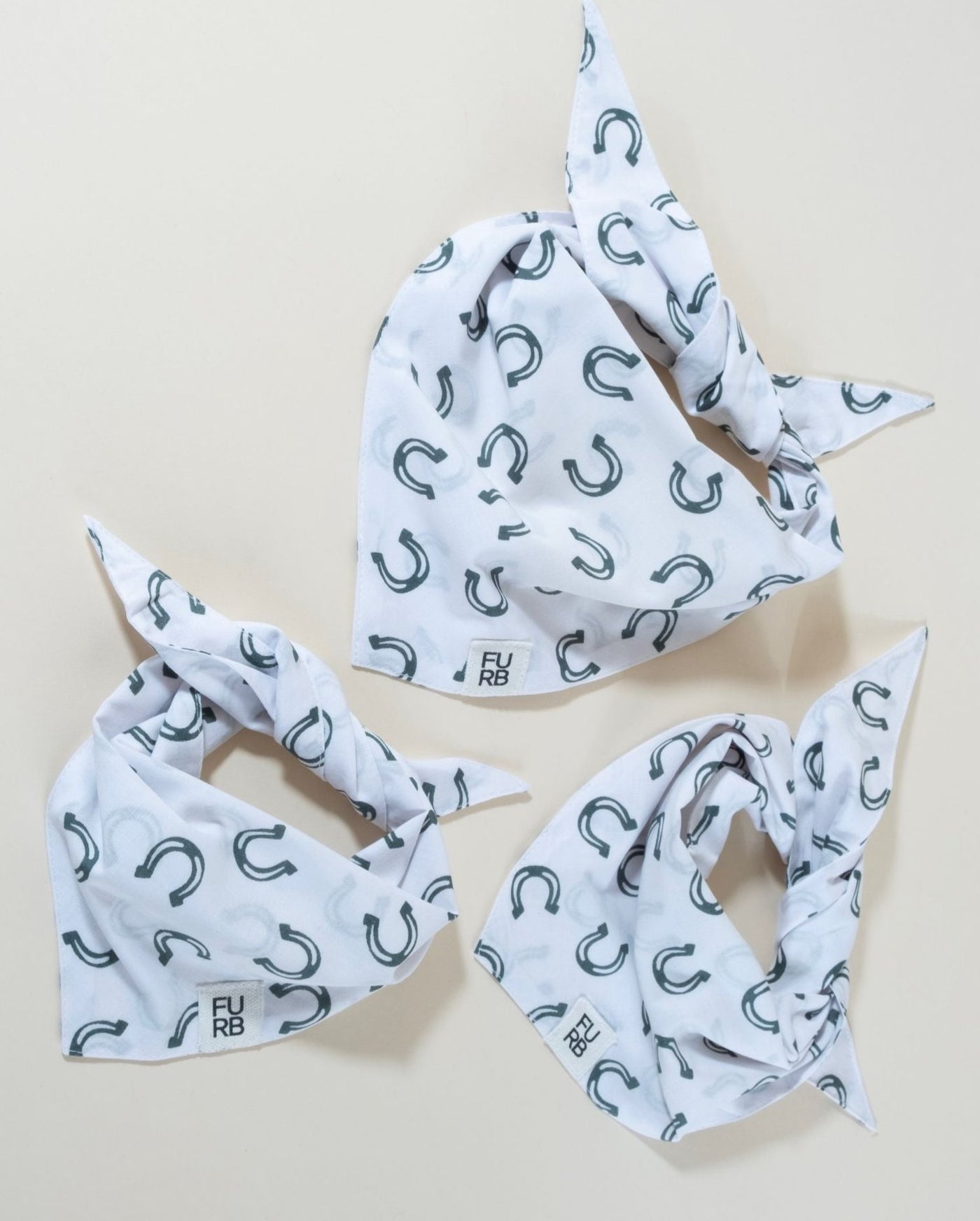 Lucky charm horseshoe dog bandana, ideal for any lucky pup.