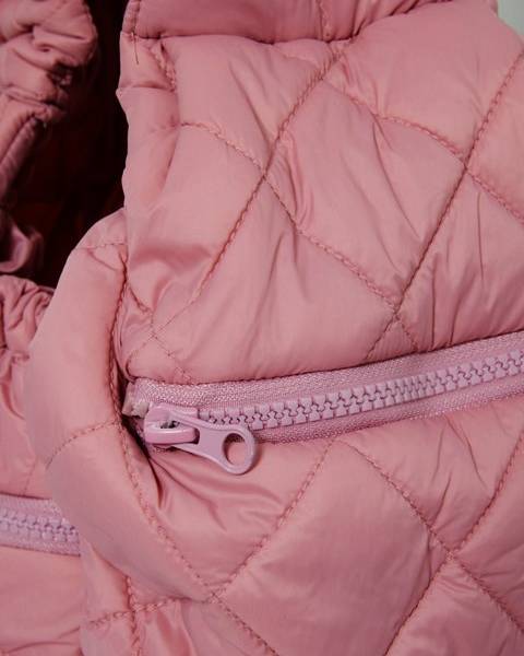 Lightweight Maxbone Berry Sling Carrier in pink, ensuring a cozy ride for your pup.