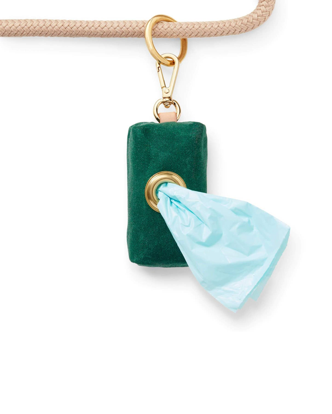 Waxed green cotton canvas is complete with elevated brass hardware. Sleek clasp easily attaches to your leash's O ring. There's no mess left behind with this adorable accessory.