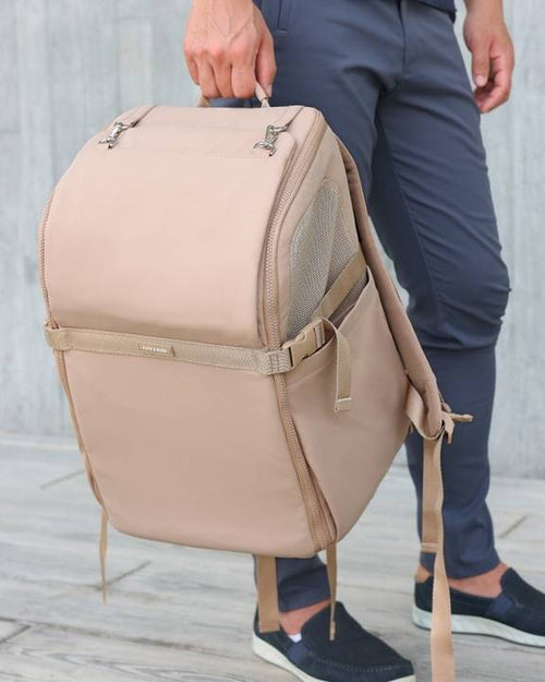 Functional Pet Carrier Backpack in tan, perfect for hiking and traveling with your small dog.