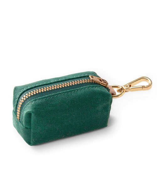 Waxed green cotton canvas is complete with elevated brass hardware. Sleek clasp easily attaches to your leash&