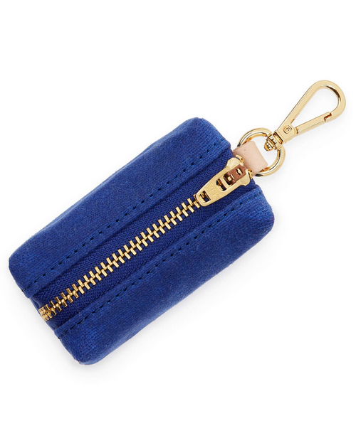 Waxed blue cotton canvas is complete with elevated brass hardware. Sleek clasp easily attaches to your leash&