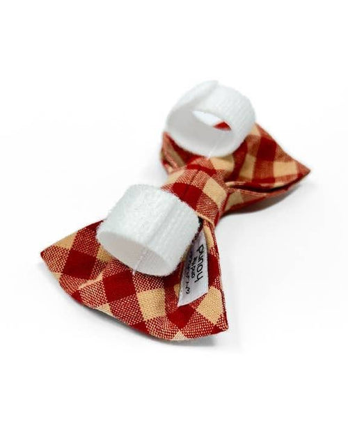 Elegant red and tan checkered dog bow tie, a chic accessory for your pup.
