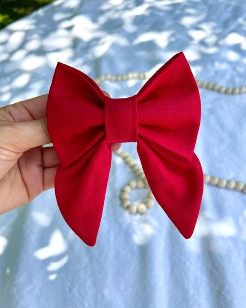 Elegant red lady bow for dogs, perfect for special occasions