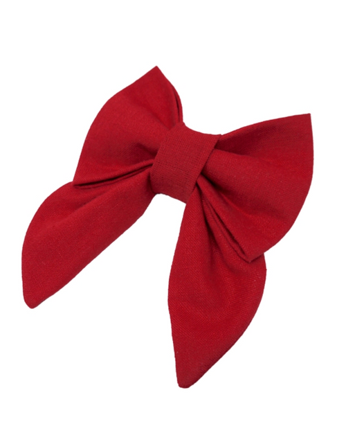 Cute red bow for lady dogs, adding a fashionable touch