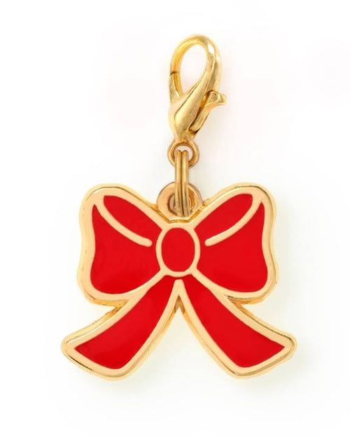 Cute red bow charm for dog collars, perfect for small to medium breeds like French Bulldogs and Beagles
