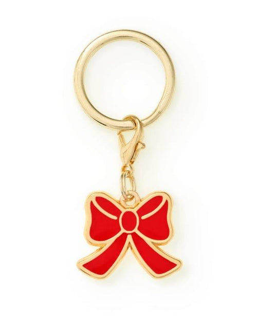 Elegant red bow collar charm, ideal for small dogs like Cocker Spaniels and Shih Tzus