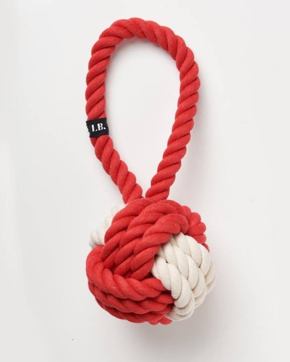 Red and white rope toy, perfect for small to medium-sized dogs like French Bulldogs and Poodles.