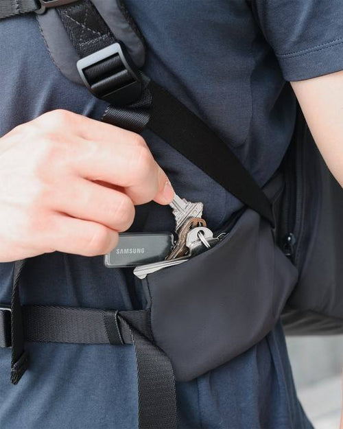 Stylish Pet Carrier Backpack in black, ensuring your pet travels in comfort. Lots of pockets.
