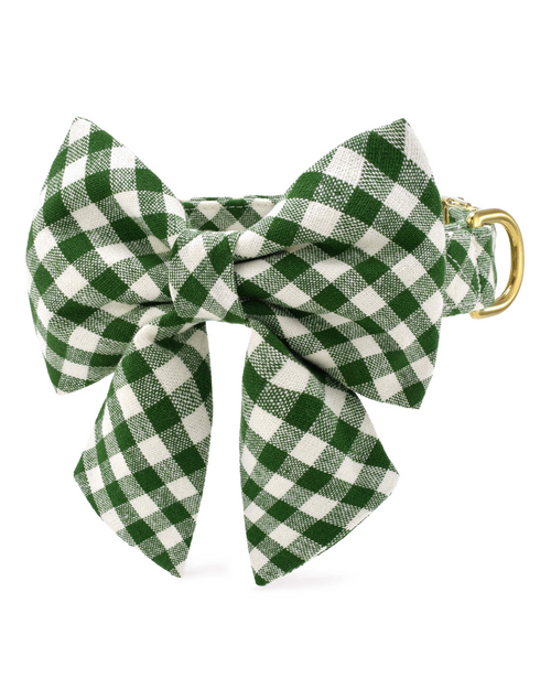 Gingham lady bow for small to medium dogs, like Beagles and Pugs, perfect for festive looks.