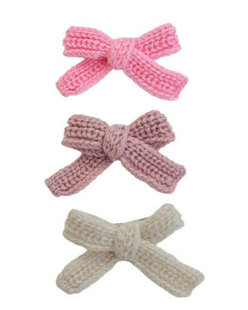 Cute bright pink hair bow for dogs, a perfect accessory for your little fashionista