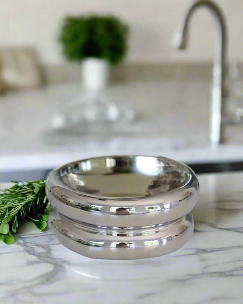 Durable and chic chrome pet bowl for small dogs, perfect for Chihuahuas or Doodles.