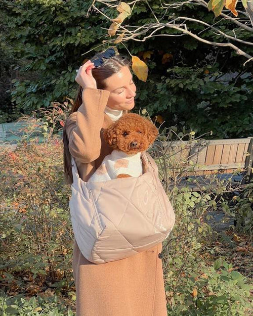 Nude Quilted Crossbody Pet Carrier - The stylish and practical carrier for pet owners on the move.