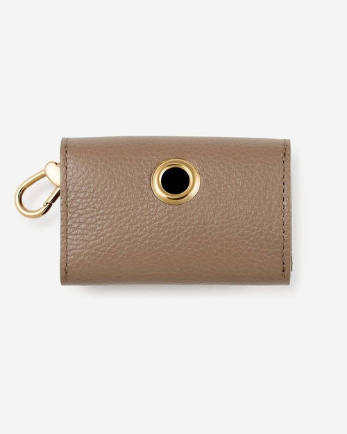 Light taupe dog harness and leash, offering adjustable straps for the perfect fit and secure walks.