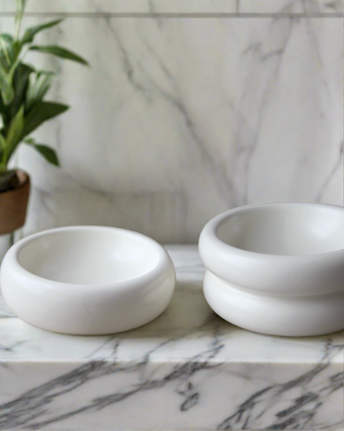 The Modern Muse Pet Bowl Set is crafted from quality ceramic, which is both chic and practical. Home decor friendly, this bowl set pairs one low bowl with one high for the perfect combo.