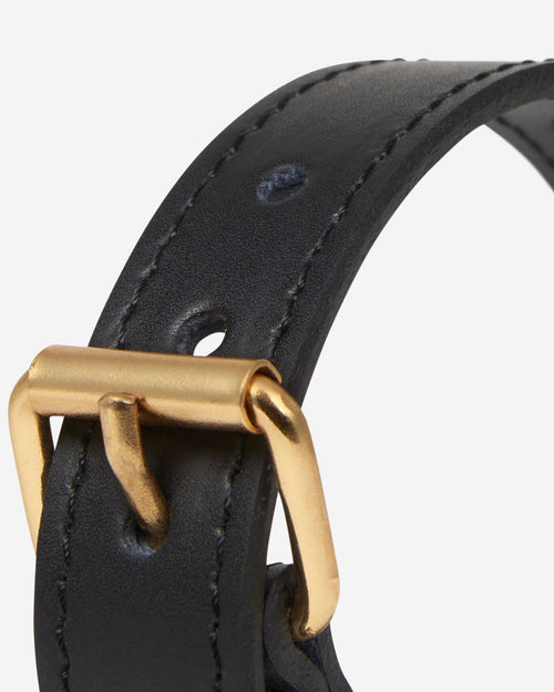 Nara black leather dog collar with star studs, buckle close-up showing adjustable fit